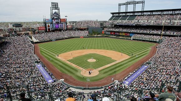 view of the coors field in denver behind home plate