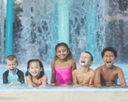 a group of kids enjoying one of the biggest water parks in florida