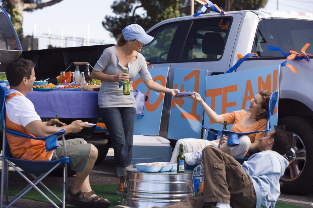 Using real plates instead of disposable ones can help you save money and environment at your next tailgate party. 