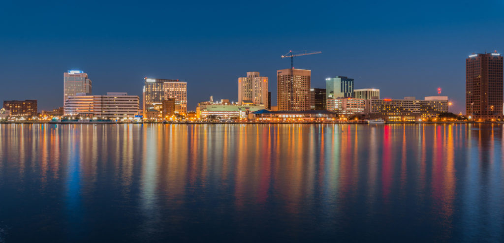 The Norfolk skyline at night. 