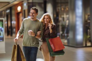 A couple taking advantage of Labor Day deals on a shopping spree. 